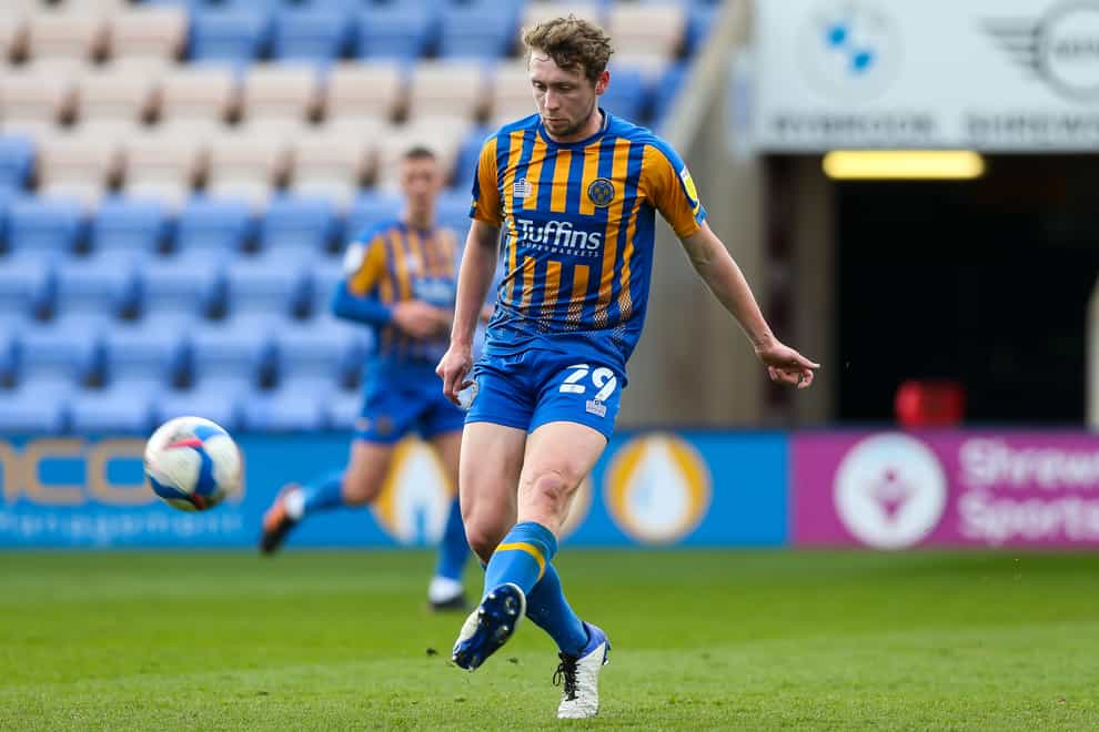 Matthew Pennington will miss Shrewsbury’s match with Gillingham due to suspension (Barrington Coombs/PA)