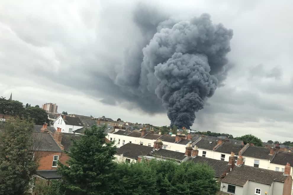 Huge plumes of smoke can be seen rising from the scene (West Midlands Ambulance Service/PA)