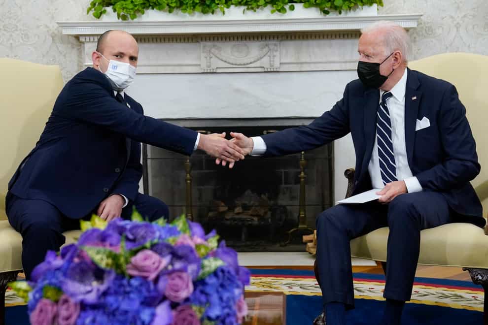 President Joe Biden shakes hands with Israeli Prime Minister Naftali Bennett (Evan Vucci/AP)