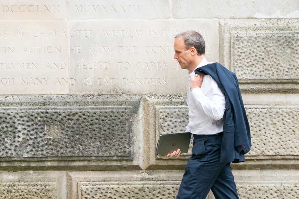 Foreign Secratary Dominic Raab arrives at the Foreign Office in Westminster (Dominic Lipinski/PA)