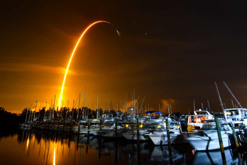 Tthe launch of a SpaceX Falcon 9 rocket on a resupply mission for Nasa to the International Space Station from Pad 39A at Kennedy Space Centre, seen from Merritt Island, Florida (Malcolm Denemark/Florida Today via AP)