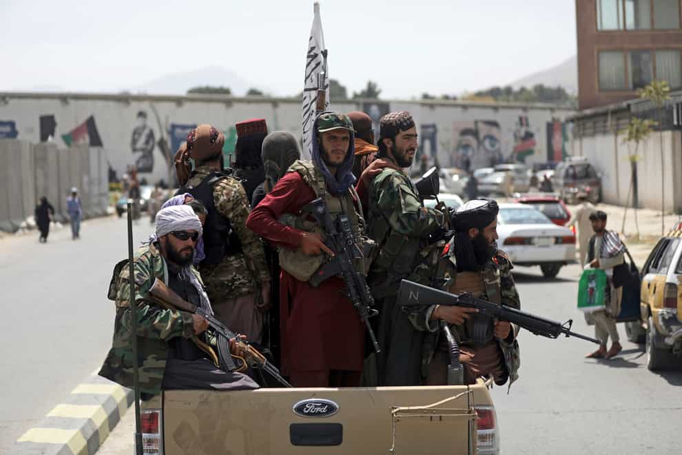 Taliban fighters patrol in Kabul, Afghanistan (Rahmat Gul/AP)