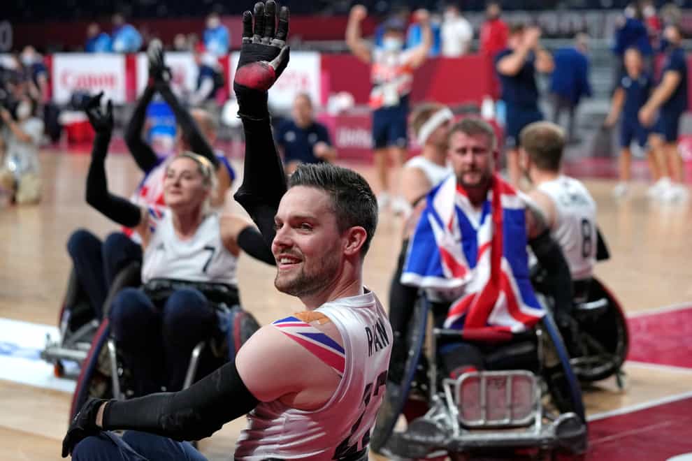 Great Britain celebrate wheelchair rugby gold (Shuji Kajiyama/AP)