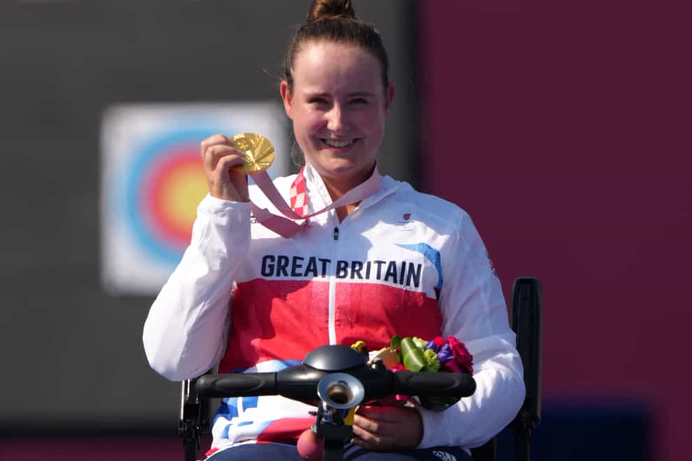 Great Britain’s Phoebe Paterson Pine poses on the podium with her archery gold medal (Tim Goode/PA)