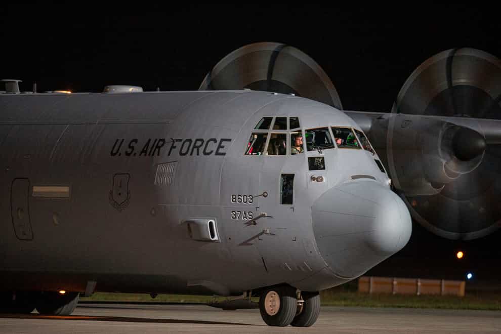A US air force aircraft carrying families evacuated from Kabul (Visar Kryeziu/AP)