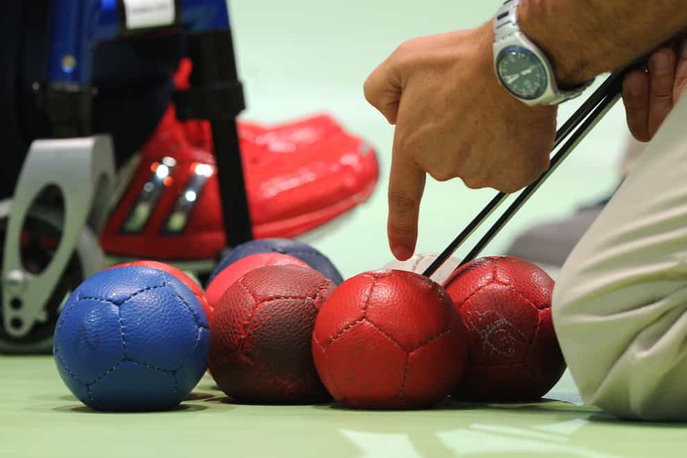 Measurements are made during the Boccia mixed pairs BC3 bronze medal match at the ExCel Arena, London