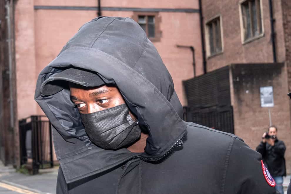 Manchester United defender Aaron Wan-Bissaka leaving Manchester Magistrates Court where he pleaded guilty to driving whilst disqualified, without a licence and without insurance (Danny Lawson/PA)