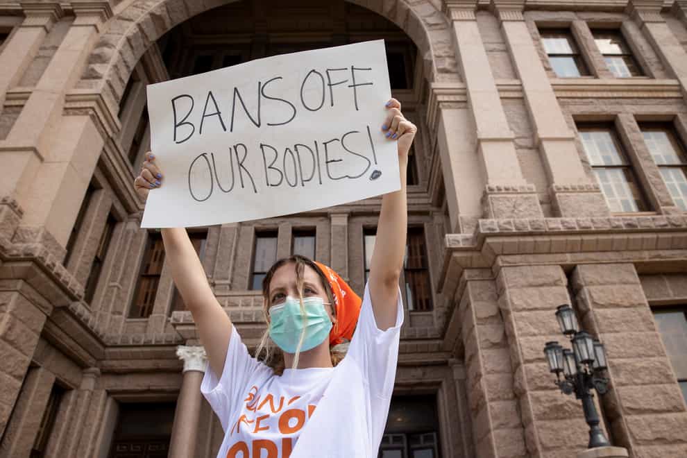 Jillian Dworin participates in a protest against the six-week abortion ban at the Capitol in Austin, Texas (Jay Janner/Austin American-Statesman via AP)