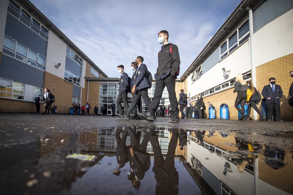 Students arriving at St Andrew’s RC Secondary School in Glasgow (Jane Barlow/PA)
