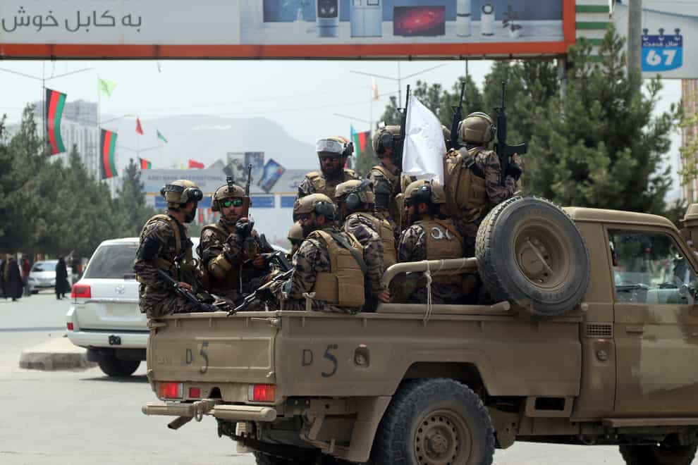 Taliban special force fighters at Hamid Karzai International Airport (Khwaja Tawfiq Sediqi/AP)