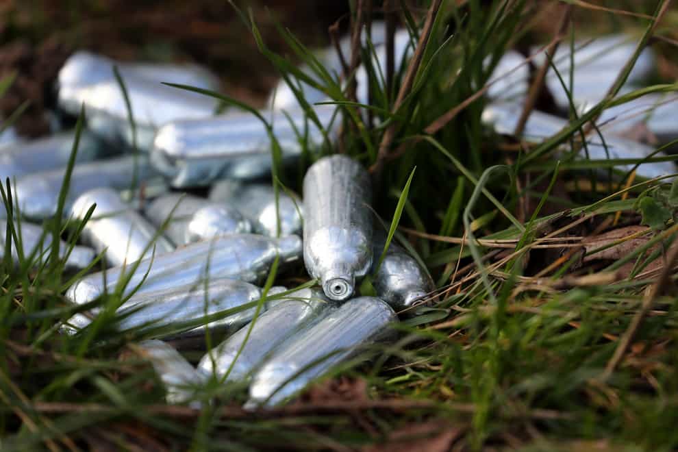 Canisters of laughing gas discarded by the side of a road near Ebbsfleet, Kent.(Gareth Fuller/PA)