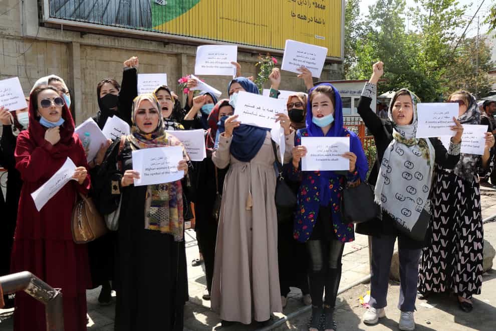 Women stage a protest in Kabul (Wali Sabawoon/AP)