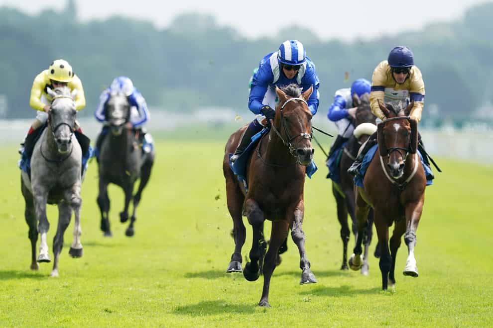 Hukum (centre, blue) goes for a third successive Group Three win in the Unibet September Stakes (Martin Rickett/PA)