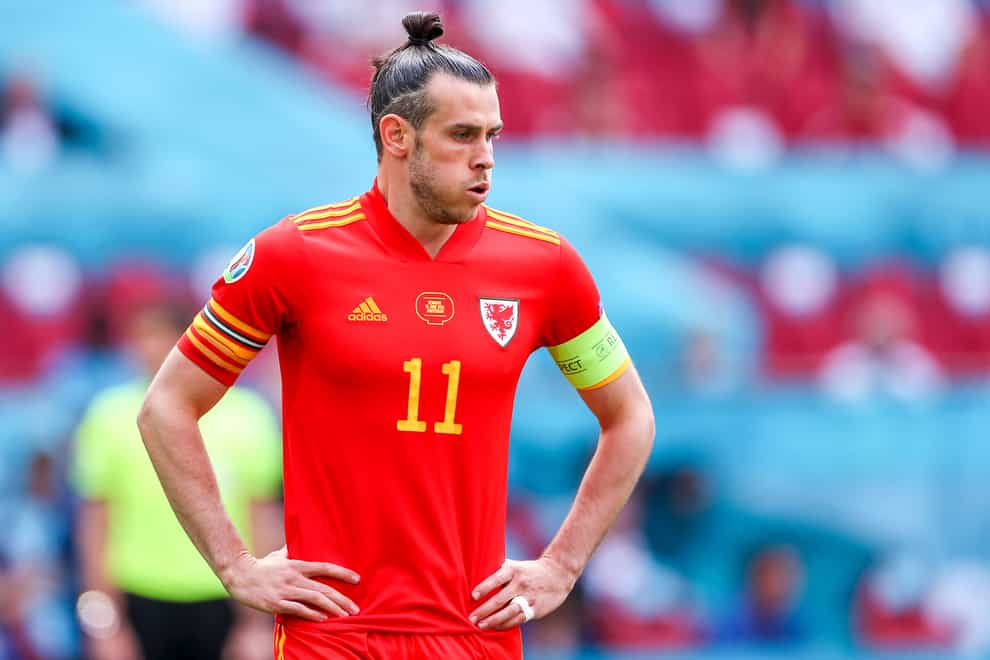 Wales captain Gareth Bale says he would be happy to lead his players off the pitch if they were subjected to racial abuse (PA)