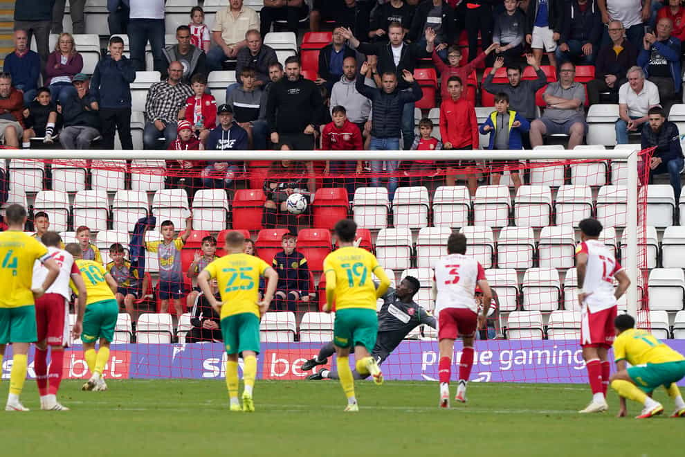 Jack Payne scores from the penalty spot to earn Swindon a point at Stevenage (Jonathan Brady/PA)