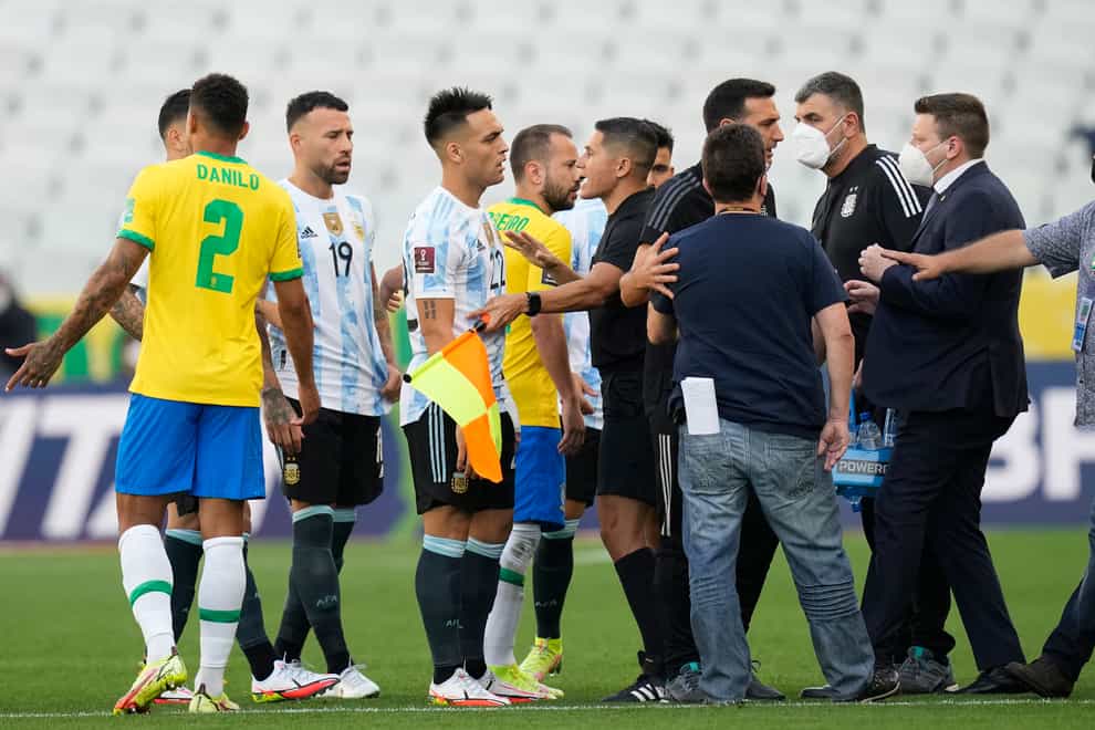 The match in Sao Paolo was suspended after officials came on to the pitch (Andre Penner/AP).
