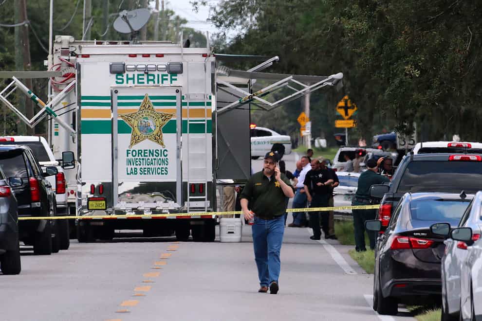 Police at the scene of the multiple in Lakeland (Michael Wilson/The Ledger via AP)