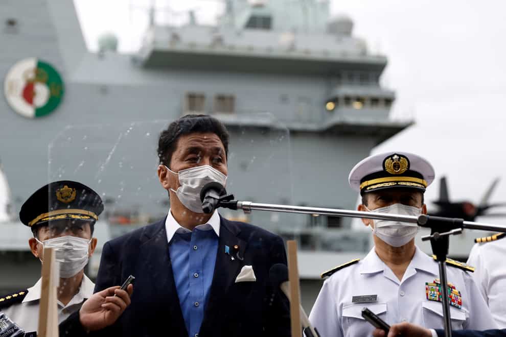 Japan Defence Minister Nobuo Kishi speaks to the media after inspecting HMS Queen Elizabeth (Kiyoshi Ota/Pool Photo via AP)