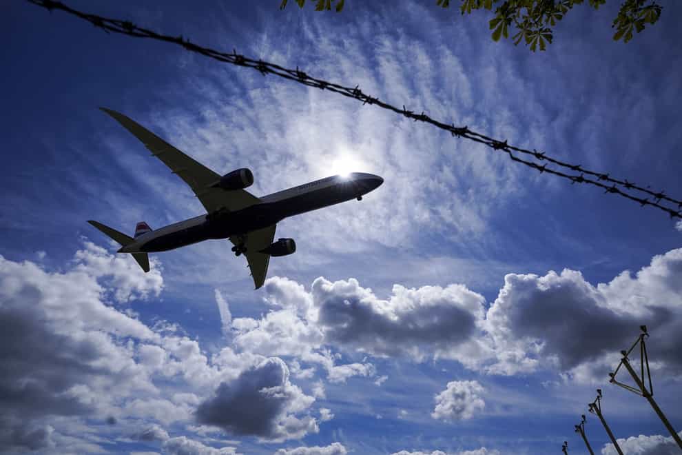 A return flight to the US emits about one tonne of carbon dioxide (Steve Parsons/PA)