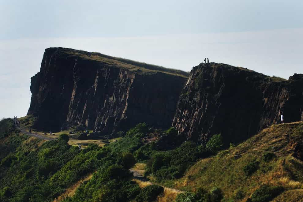 A man has been charged with murder in connection with the death of a woman who fell from Arthur’s Seat (Andrew Milligan/PA)