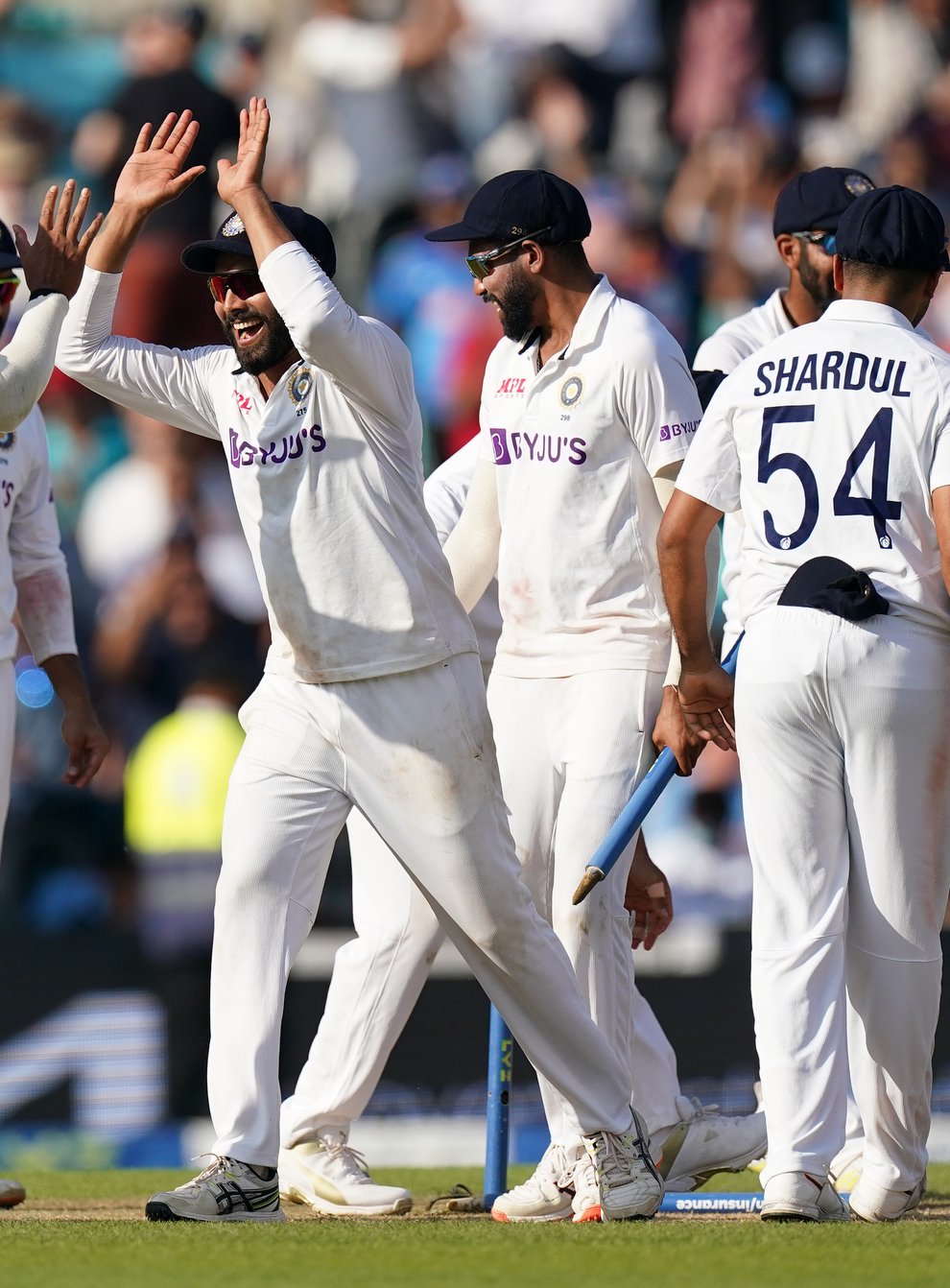 India players celebrate winning the Test (Adam Davy/PA)