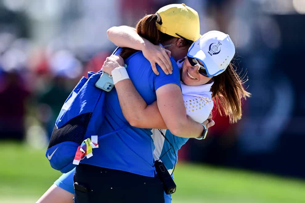 Europe’s Leona Maguire (right) celebrates with her sister Lisa after beating Jennifer Kupcho in the Solheim Cup (David Dermer/AP)