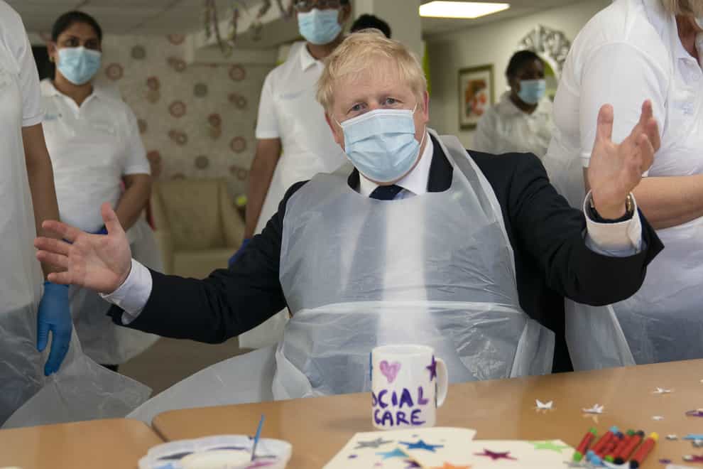 Prime Minister Boris Johnson during a visit to Westport Care Home in Stepney Green, east London (Paul Edwards/The Sun/PA)