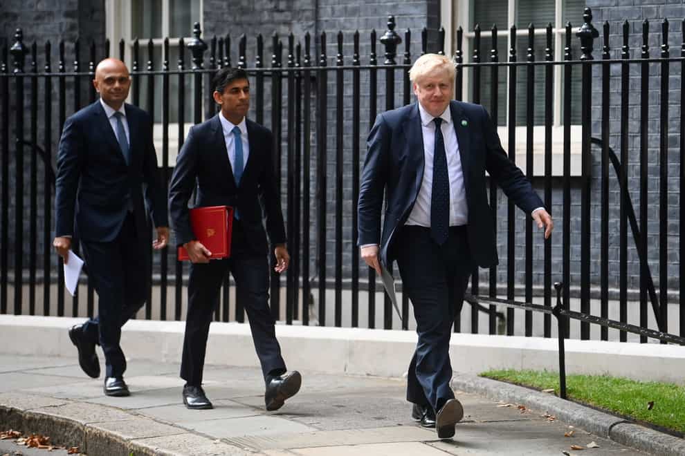 Health Secretary Sajid Javid, Chancellor of the Exchequer Rishi Sunak and Prime Minister Boris Johnson arriving at No 9 Downing Street for a media briefing on the long-awaited plan to fix the broken social care system. (Toby Melville/PA)