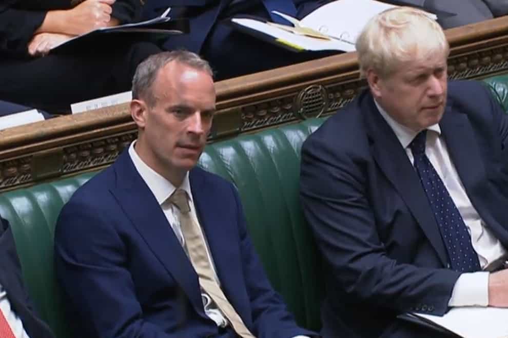 Foreign Secretary Dominic Raab with Prime Minister Boris Johnson (House of Commons/PA)