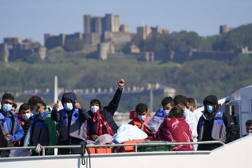 A group of people thought to be migrants are brought in to Dover, Kent, aboard a Border Force vessel following a small boat incident in the Channel (Steve Parsons/PA)