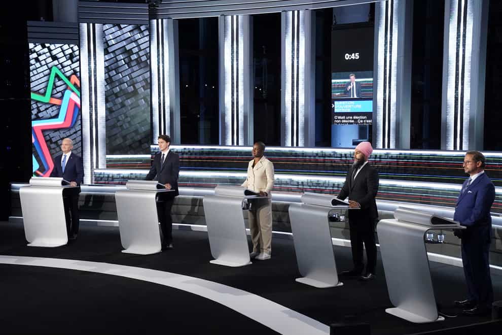 From left to right, Conservative leader Erin O’Toole, Liberal leader Justin Trudeau, Green leader Annammie Paul, New Democratic Party leader Jagmeet Singh and Bloc leader Yves-Francois Blanchet stand at their podiums before the federal election French-language leaders debate, Wednesday, Sept. 8, 2021, in Gatineau, Quebec (Sean Kilpatrick/The Canadian Press/AP)