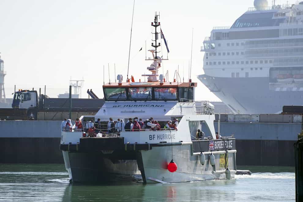 A group of people thought to be migrants are brought in to Dover, Kent, aboard a Border Force vessel following a small boat incident in the Channel. (Steve Parsons/PA) Picture date: Wednesday September 8, 2021.