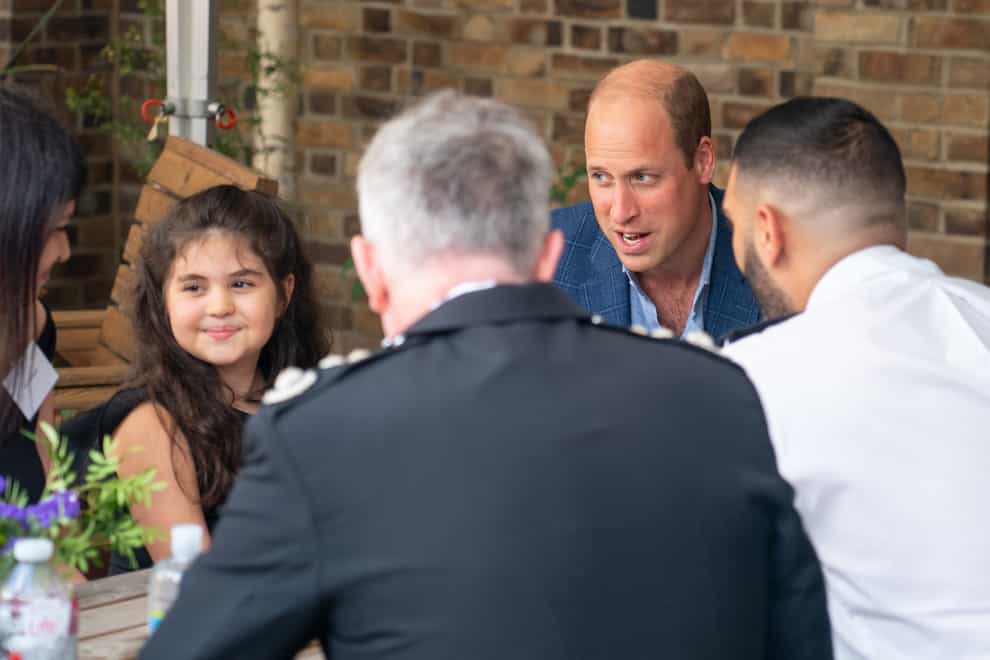 The Duke of Cambridge speaks to Noura during a visit to meet emergency responders and members of the public who received their life-saving support (Dominic Lipinski/PA)