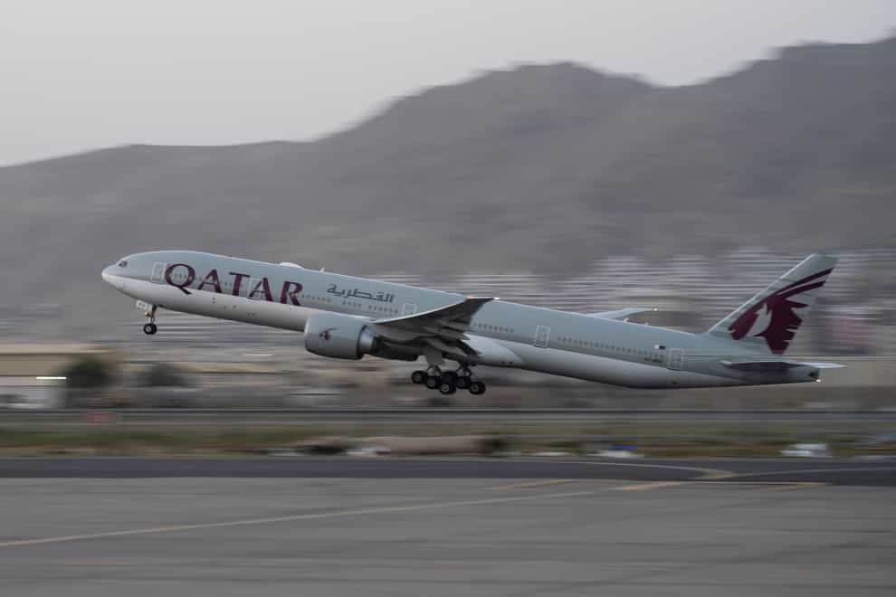 A Qatar Airways aircraft takes off from the airport in Kabul (Bernat Armangue/AP)