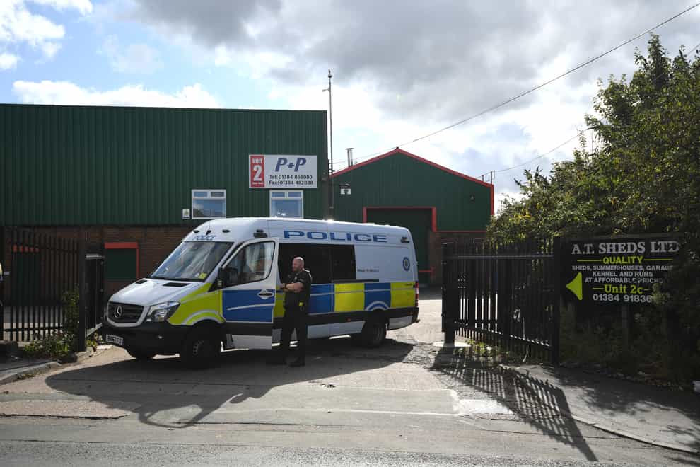 Police at Albion Works industrial estate in Brierley Hill, West Midlands, after the double shooting (Joe Giddens/PA)