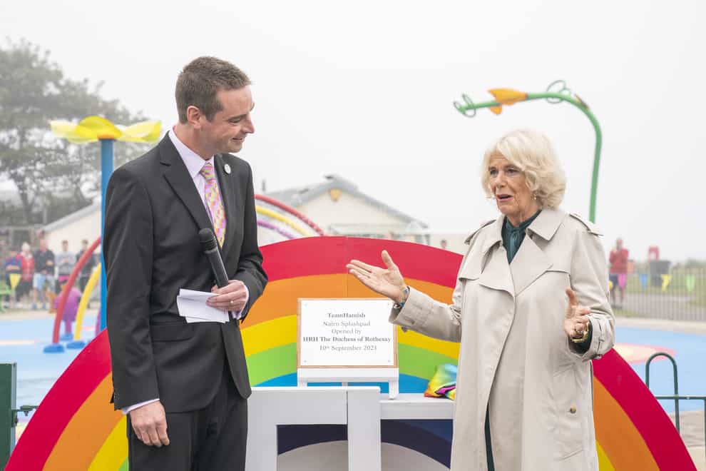 The Duchess of Cornwall, with Sam Heys at the opening of the Team Hamish Splashpad in Nairn (Jane Barlow/PA)