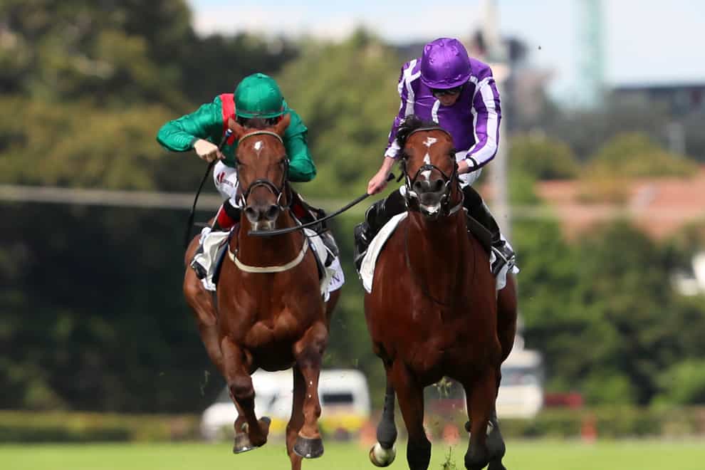 Ryan Moore riding St Mark’s Basilica (right) oil their way to winning the Irish Champion Stakes during day one of the Longines Irish Champions Weekend at Leopardstown racecourse. Picture date: Saturday September 11, 2021.