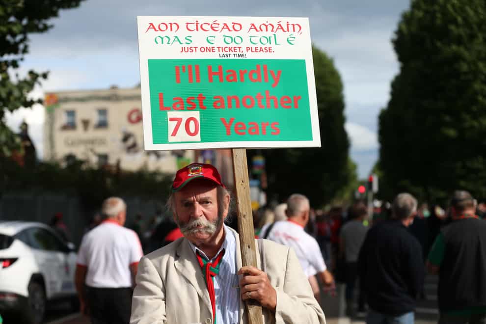 A fan with a sign at Croke Park, Dublin, ahead of Tyrone taking on play Mayo in the All Ireland football final (PA)
