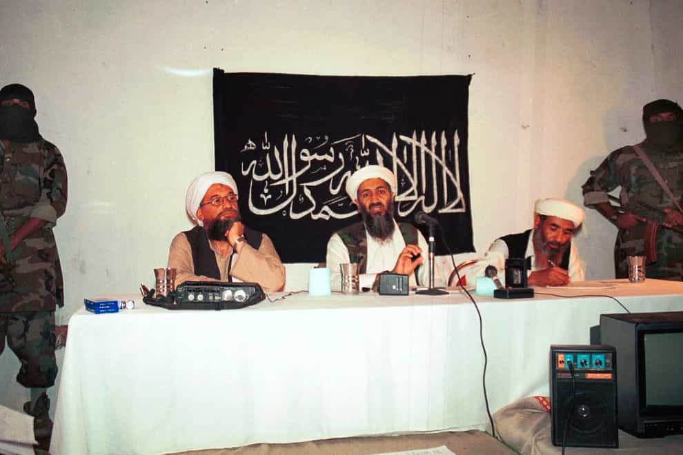 File photo of Ayman al-Zawahri, centre left, and Osama bin Laden, centre, hold a news conference in Afghanistan (AP)