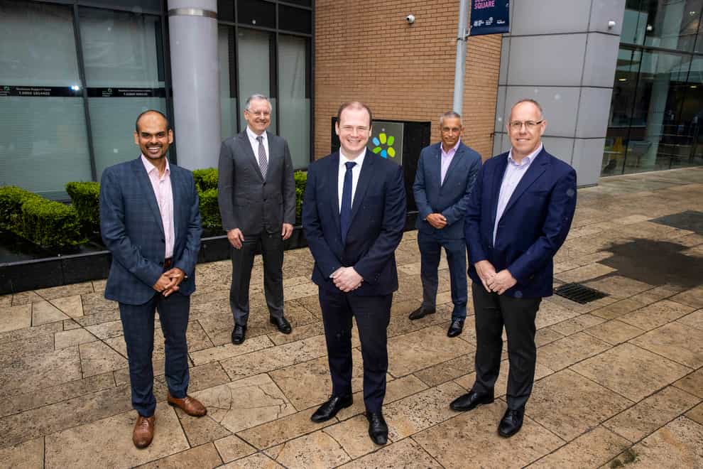 (L-R) Belfast site lead Thomas Raju, Invest NI chief executive Kevin Holland, Economy Minister Gordon Lyons, NI Economy Minister, Agio managing director of cybersecurity Ray Hallen, and chief revenue officer Garvin McKee (Liam McBurney/PA)