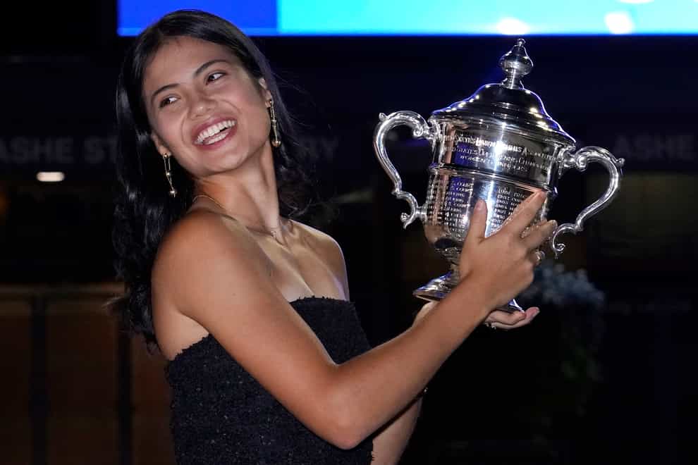 Emma Raducanu poses with the US Open trophy (Elise Amendola/AP)