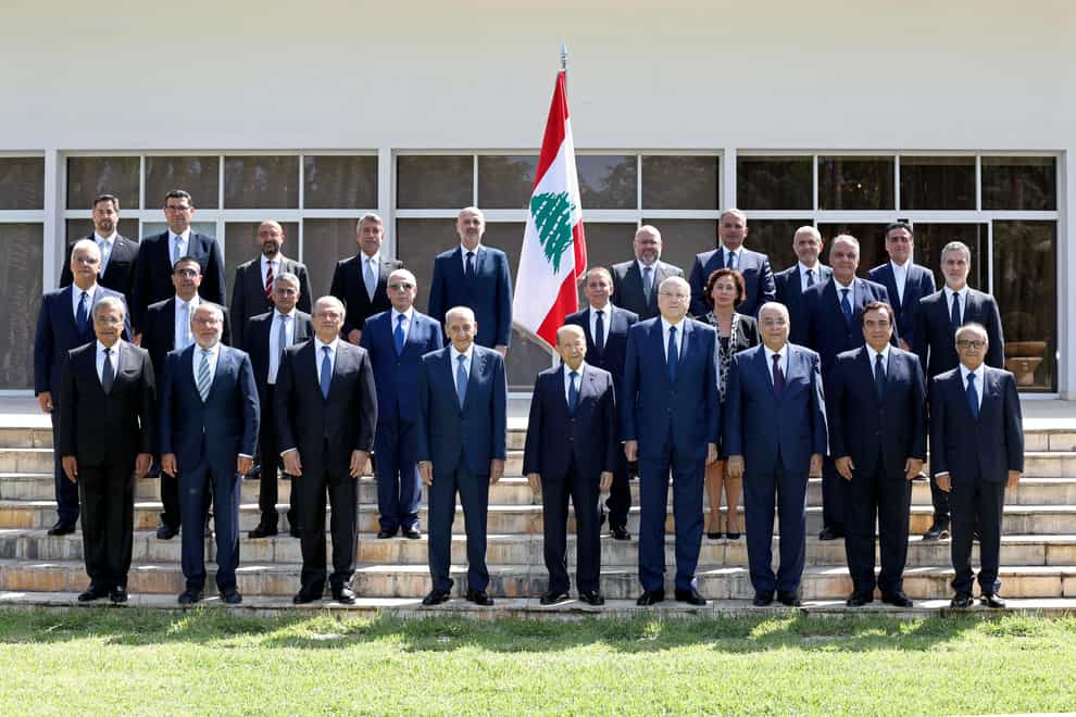 Members of the new government pose for an official picture at the Presidential Palace in Baabda, east of Beirut, Lebanon, on Monday (Dalati Nohra/Lebanese Official Government/AP)