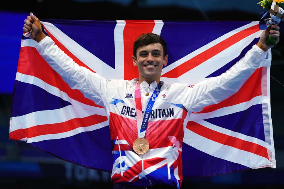 Tom Daley of Great Britain with a bronze medal following the Men’s 10m Platform Final at the Tokyo Aquatics Centre on the fifteenth day of the Tokyo 2020 Olympic Games in Japan. Picture date: Saturday August 7, 2021.