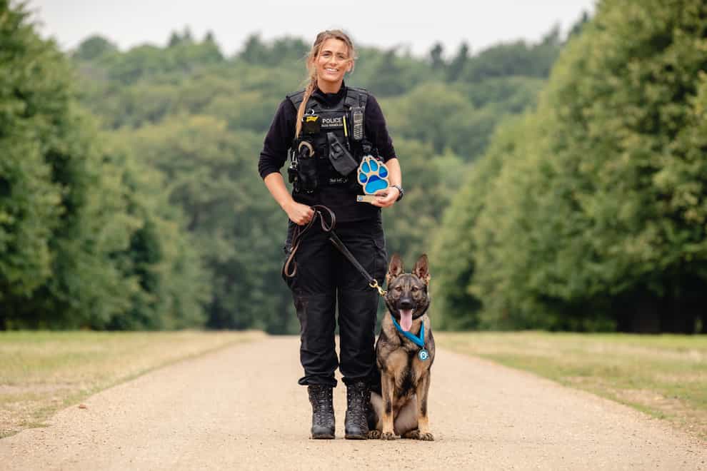 Police dog handler Pc Megan West and German shepherd Calli (Penny Bird/Thin Blue Paw Awards/PA)