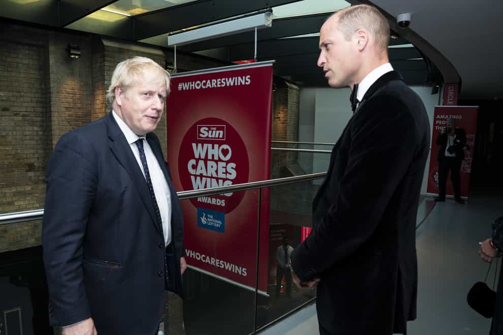 The Duke of Cambridge speaks with Prime Minister Boris Johnson at The Sun’s Who Cares Wins Awards (Arthur Edwards/The Sun)