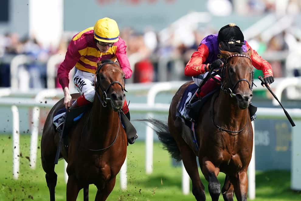 Bayside Boy (left) winning the Champagne Stakes at Doncaster (Mike Egerton/PA)