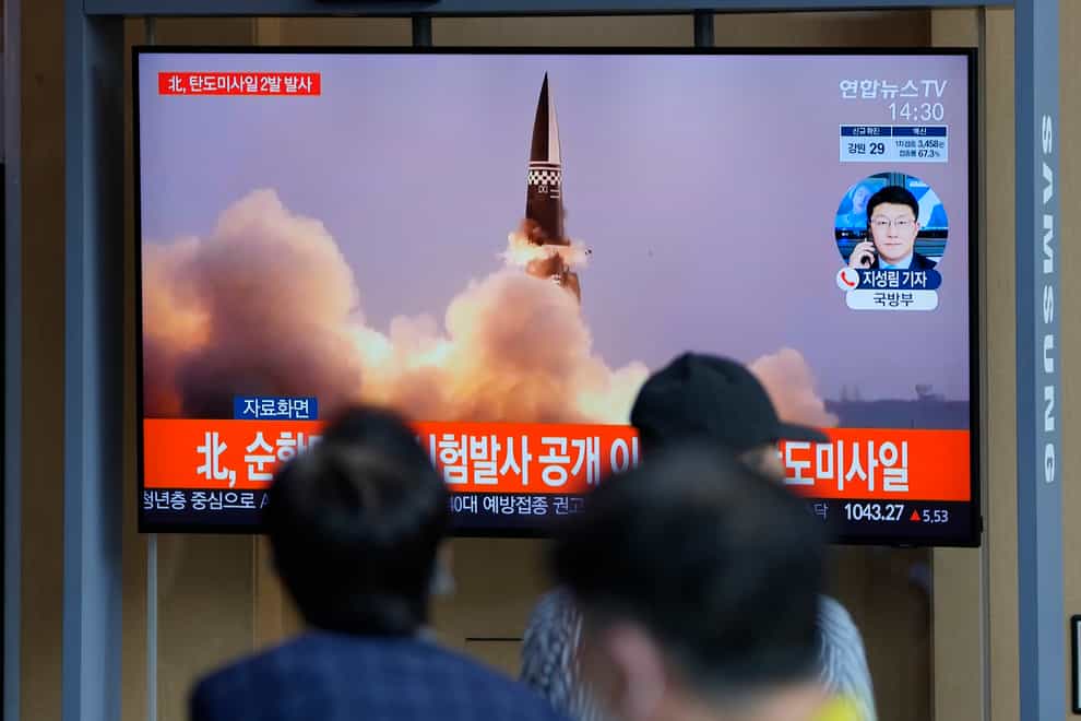 People watch a TV screen showing a news program reporting about North Korea’s missiles with file image, in Seoul, South Korea, Wednesday, Sept. 15, 2021. North Korea fired two ballistic missiles into waters off its eastern coast Wednesday afternoon, two days after claiming to have tested a newly developed missile in a resumption of its weapons displays after a six-month lull. (AP Photo/Lee Jin-man)