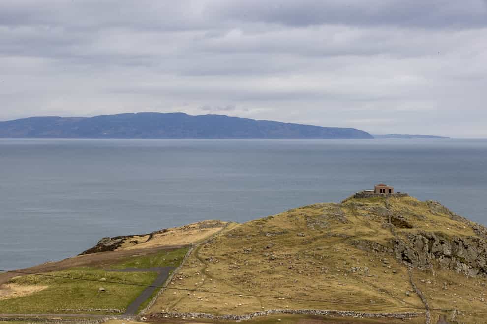 A view from Torr Head on the north Antrim coast looking over the Straits of Moyle towards the tip of the Mull of Kintyre in southwest Scotland which is a distance of 12 miles at its closest (Liam McBurney/PA)