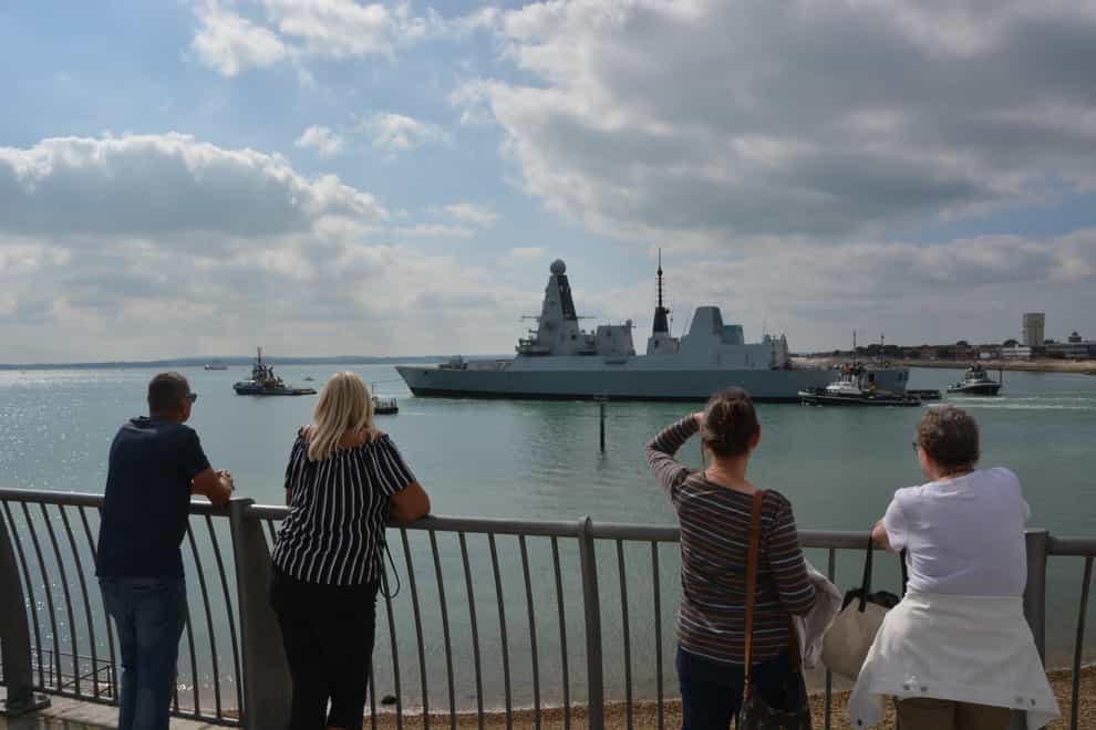 HMS Daring being towed from Portsmouth Naval Base (Ben Mitchell/PA)