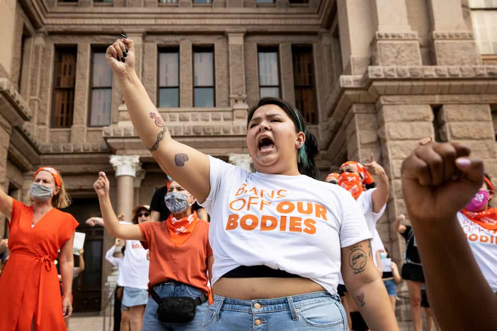 Women protest against the six-week abortion ban at the Capitol in Austin, Texas (Jay Janner/Austin American-Statesman via AP)